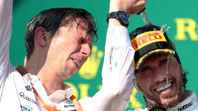 James Vowles pours champagne over Lewis Hamilton