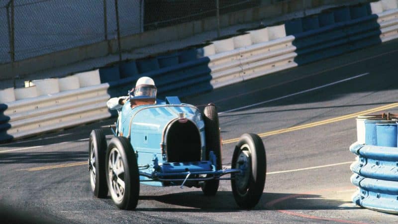 Phil Hill driving the Bugatti.
