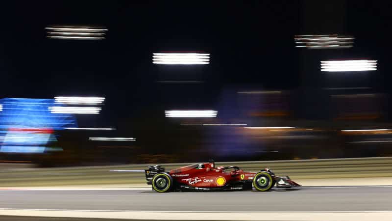 Blurred image of Charles Leclerc Ferrari side on at 2022 Bahrain Grand prix