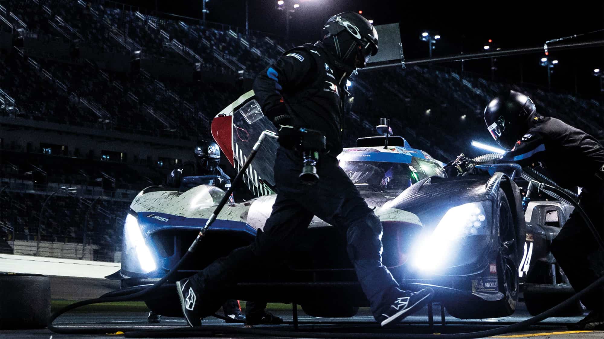 Bmw make a pit stop at daytona 24 hour at night
