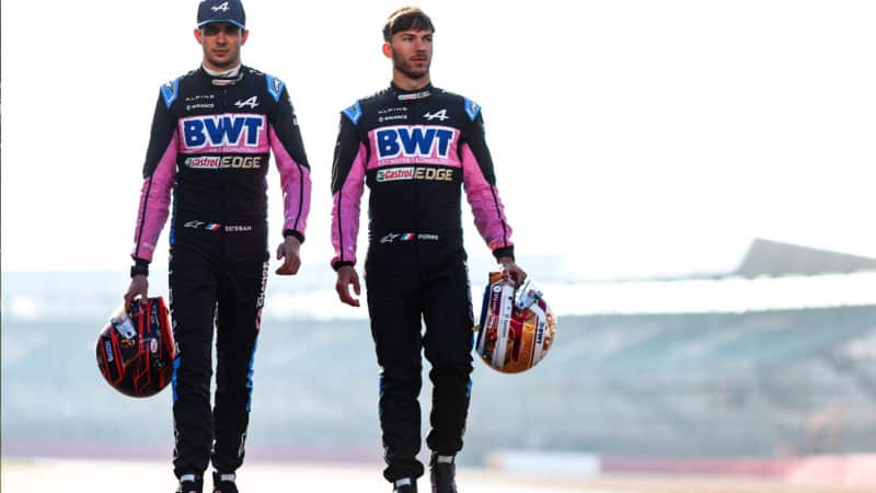 Esteban Ocon and Pierre Gasly walking on track at Silverstone for 2023 Alpine F1 launch