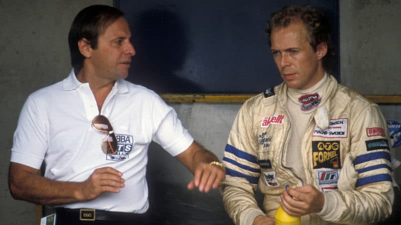 Gunter-Schmidt-and-Slim-Borgudd-in-ATS-team-pit-during-1981-F1-season