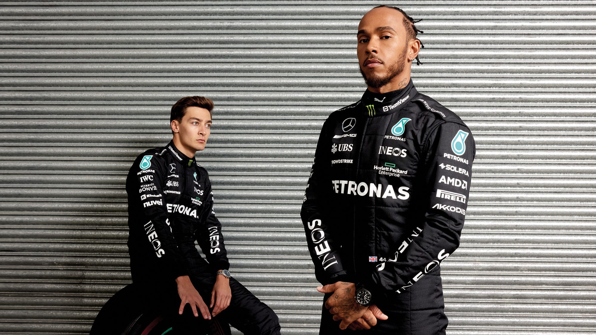 Lewis Hamilton and George Russell pose