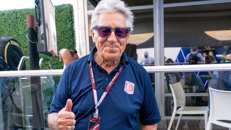 Mario Andretti gives the thumbs up in the 2022 US GP paddock