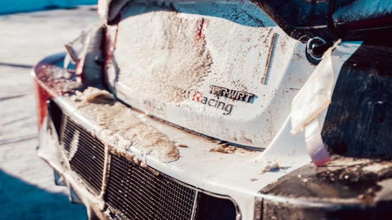 A build-up of snow and ice on the back of Toyota's WRC car