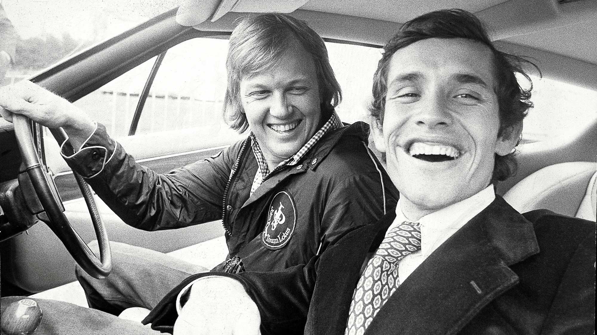 Ronnie Peterson and Jacky Ickx laugh together