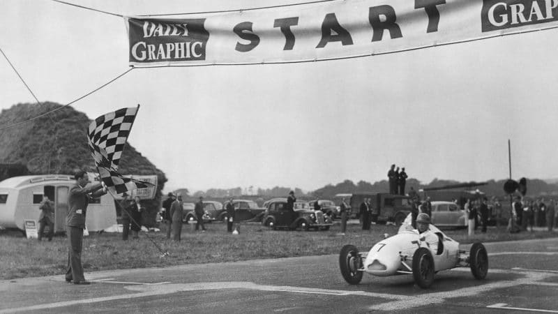 Moss taking the flag at Goodwood in 1948