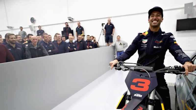 el Ricciardo on KTM motorbike at Red Bull factory