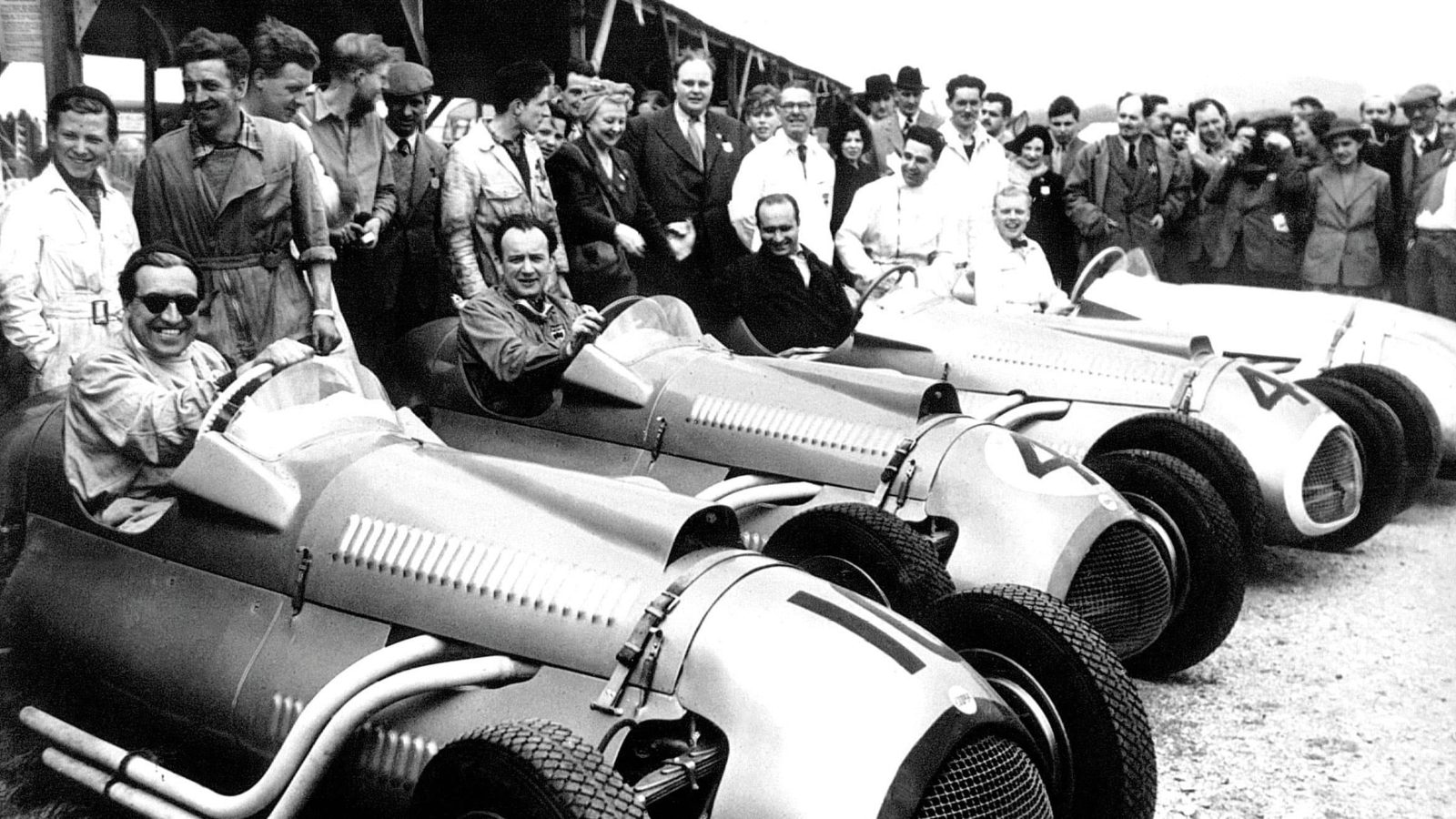 Alan Brown, Eric Brandon, Juan Manuel Fangio and Mike Hawthorn at Goodwood