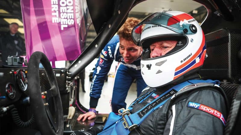 Alex Brundle helping Martin Brundle set up