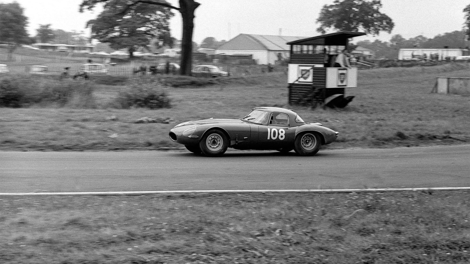 Brian Redman at Oulton in Red Rose E-type