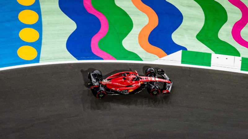 Charles Leclerc drives past multicoloured track boundary in 2023 Saudi Arabian Grand Prix