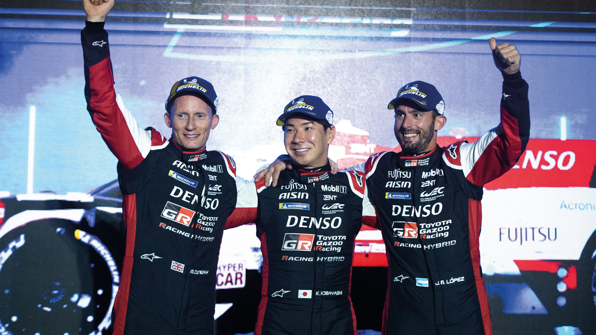 Conway, Kobayashi and López celeberate victory