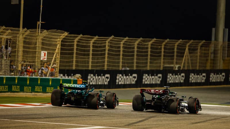 Fernando Alonso battles with George Russell