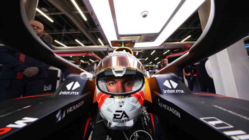 Fish eye view of Max Verstappen in Red Bull F1 car cockpit