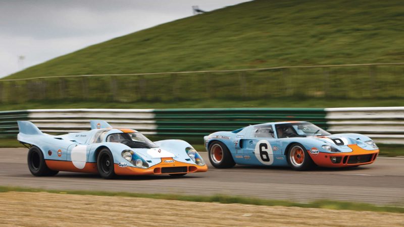 Ford GT40 and Porsche 917 side by side on track