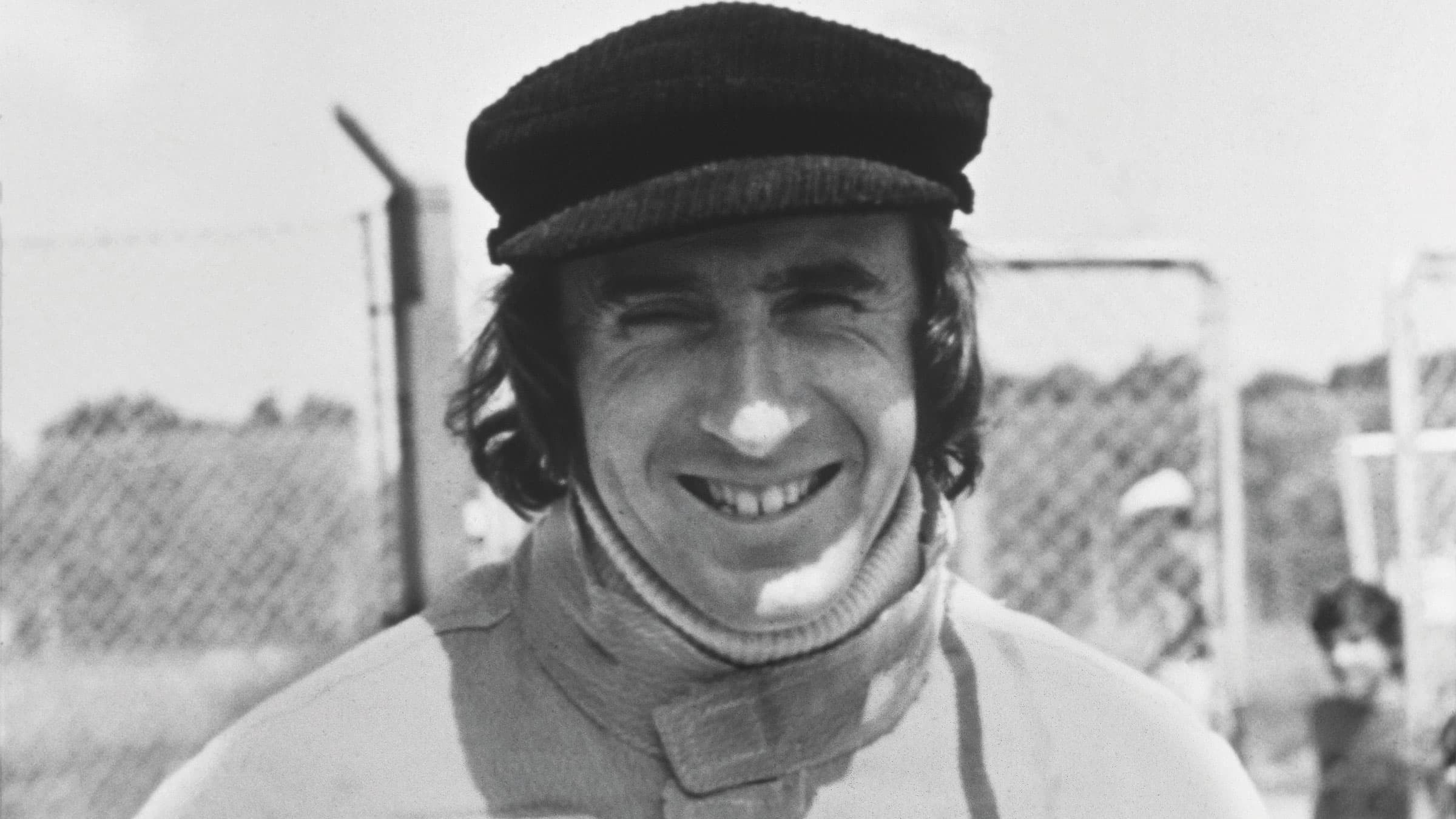 Headshot of a smiling Jackie Stewart