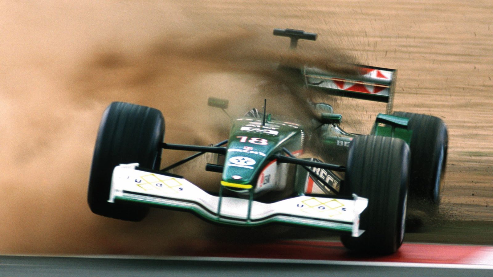 Jaguar F1 crashing through the dirt