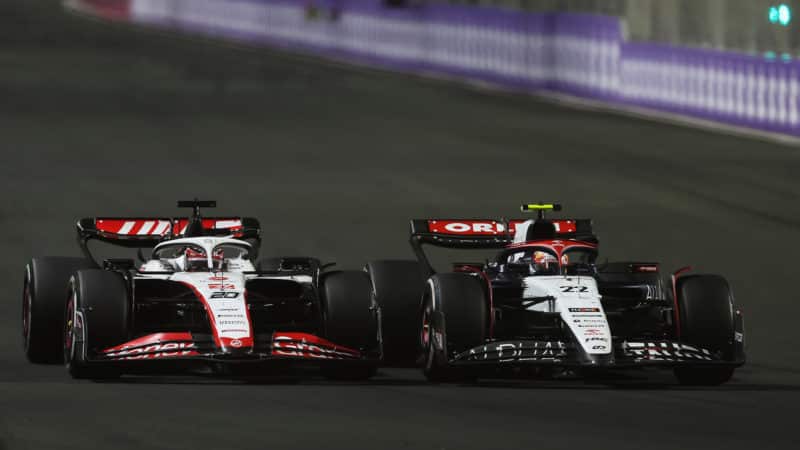 Kevin Magnussen alongside Yuki Tsunoda as they fight in the 2023 F1 Saudi Arabian GP