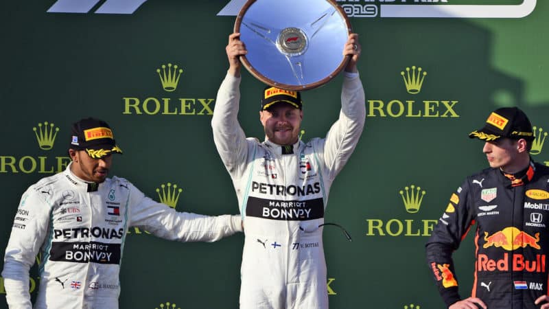 Lewis Hamilton congratulates 2019 Australian GP winner Valtteri Bottas on the podium