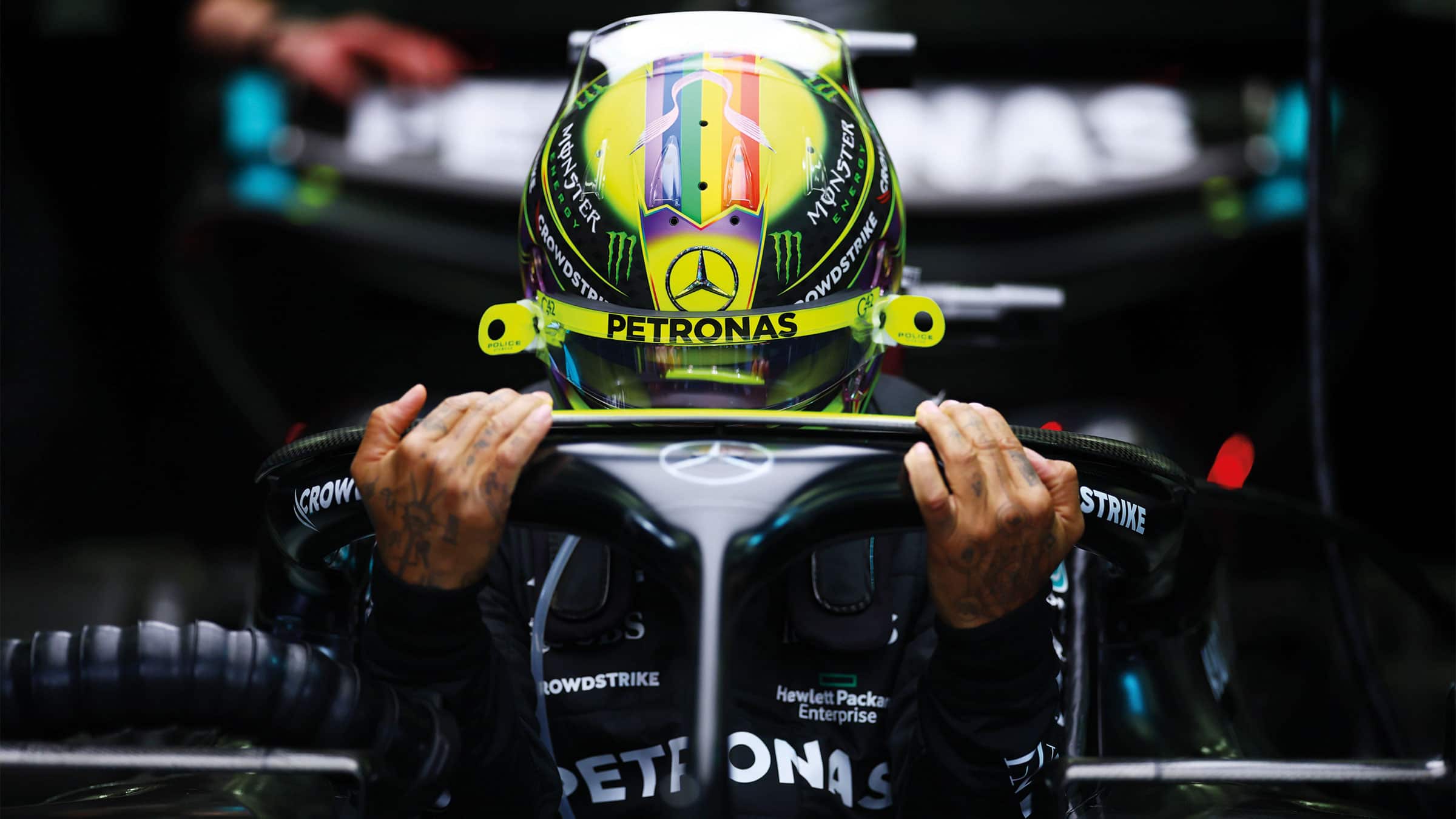 Lewis Hamilton getting into F1 car
