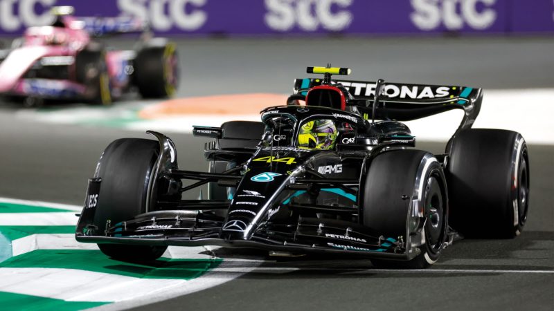 Lewis Hamiltono on track in the Black Mercedes
