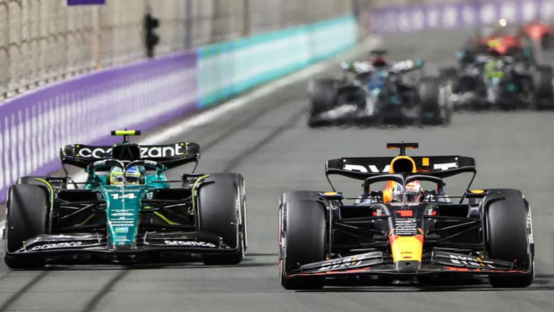 Max Verstappen passes Fernando Alonso in the 2023 Saudi Arabian Grand prix