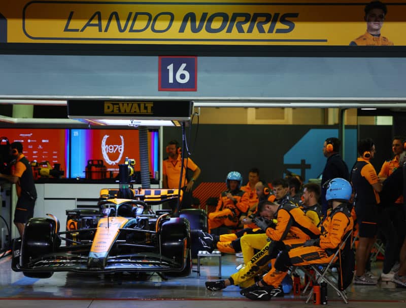 McLaren of Oscar Piastri sits in the pit garage after retiring from the 2023 Bahrain GP