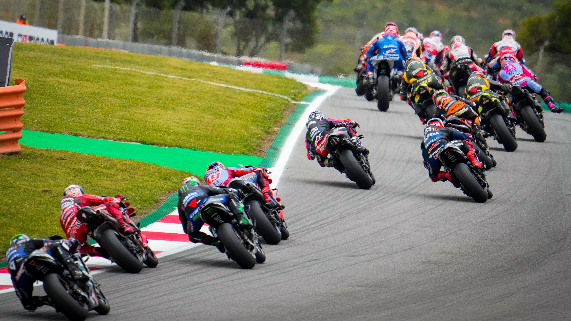 MotoGP pack races through corner