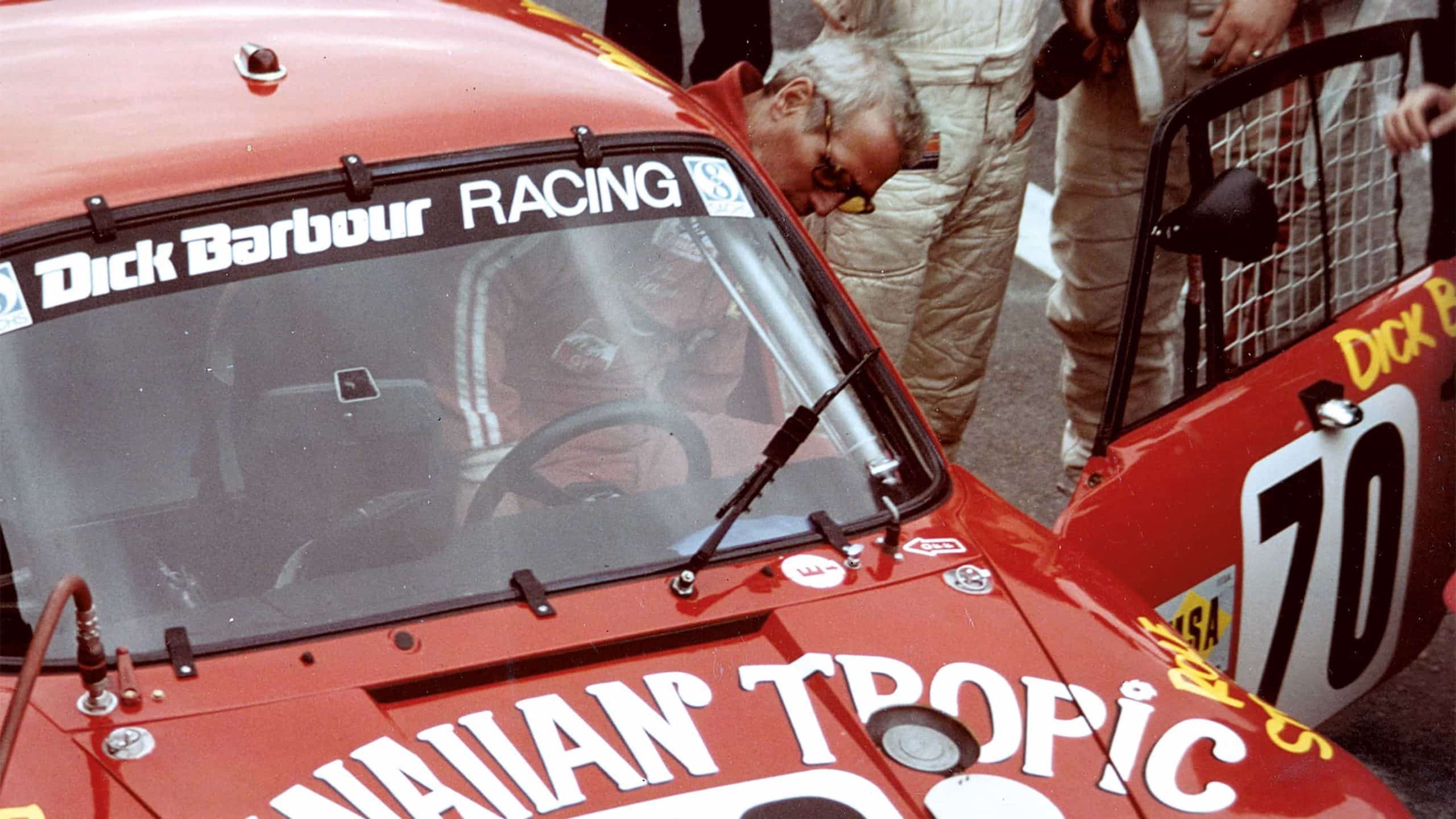 Paul Newman stepping into the car