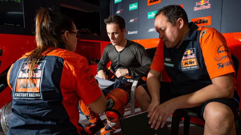 Paul Trevathan and Pol Espargaro in Red Bull KTM garage