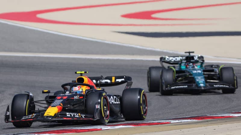 Red Bull of Sergio Perez ahead of Felipe Drugovich in Aston Martin at 2023 F1 testing