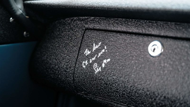 Signed dashboard by Stirling Moss