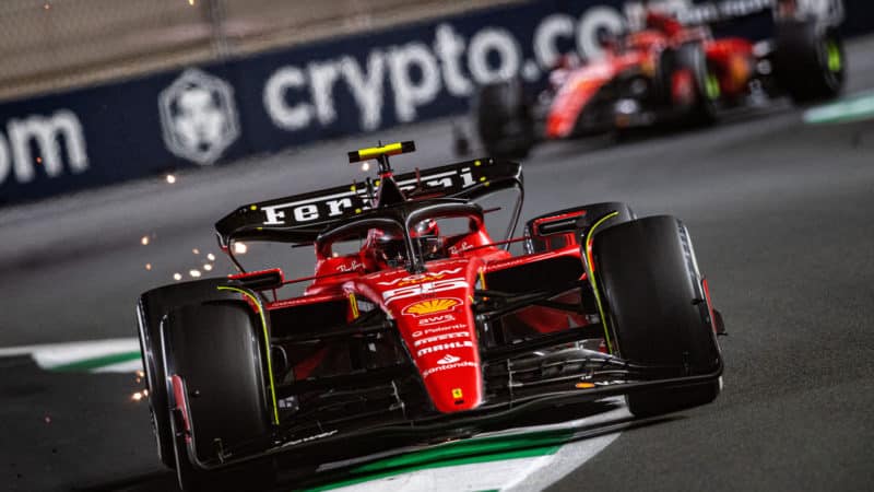 Sparks fly from Ferrari of Carlos Sainz in the 2023 F1 Saudi Arabian Grand Prix