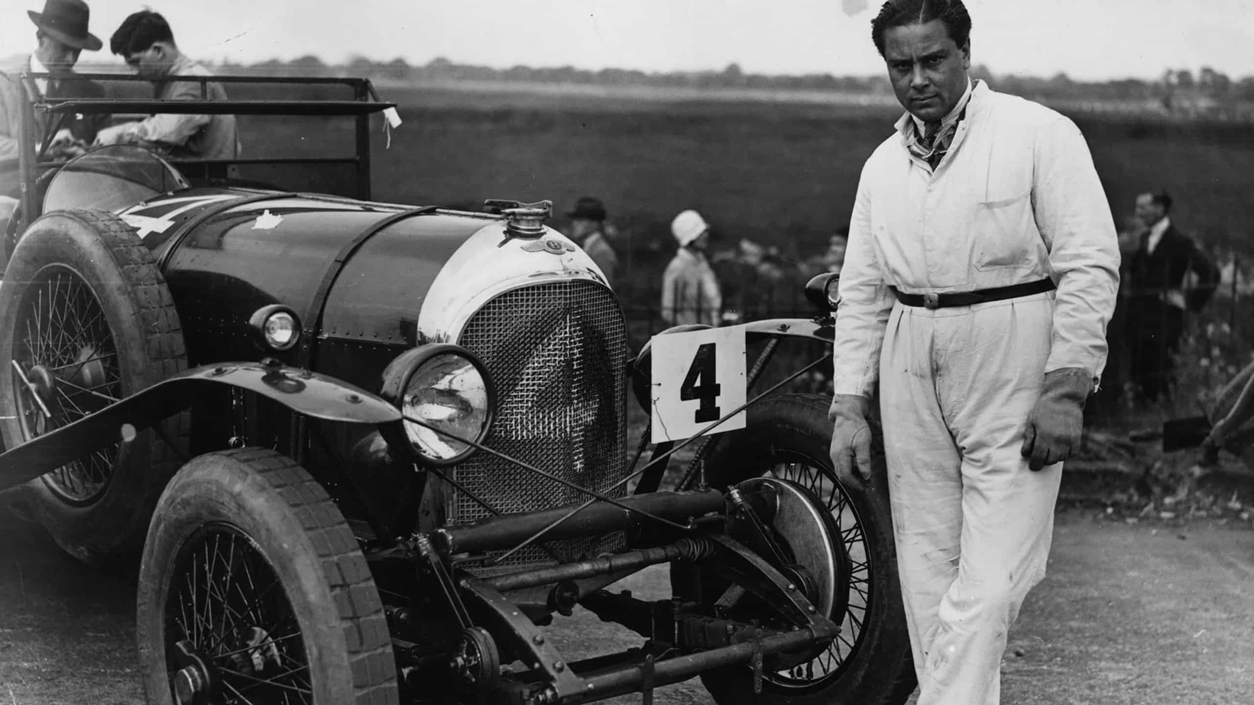 Woolf Barnato stansd beside his Bentley