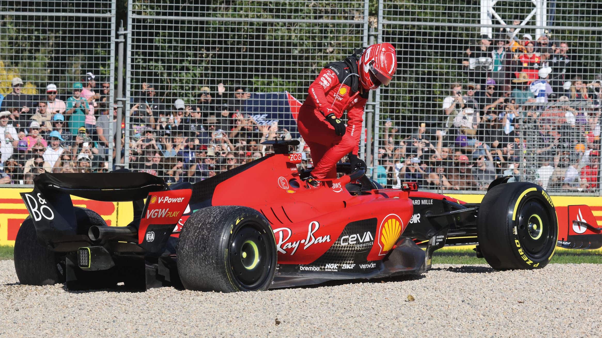 Charles Leclerc steps out of car after crash