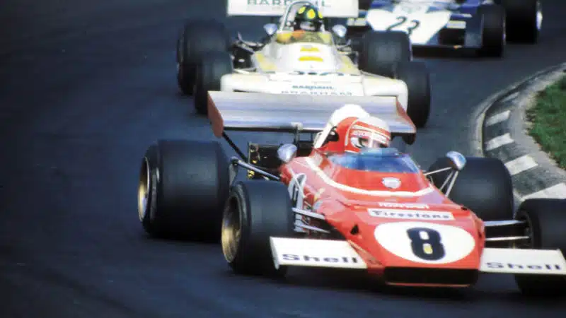 Clay Regazzoni’s Ferrari heads Fittipaldi