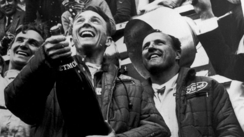 Dan Gurney and A.J. Foyt celebrate their Le Mans win in 1967