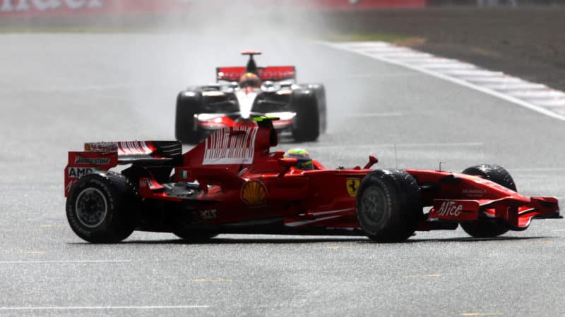 Felipe Massa spins in front of Lewis Hamilton at the 2008 British Grand Prix