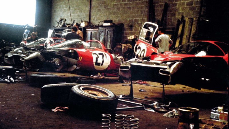 Ferrari 330 P4s being stripped down at Le Mans, 1967