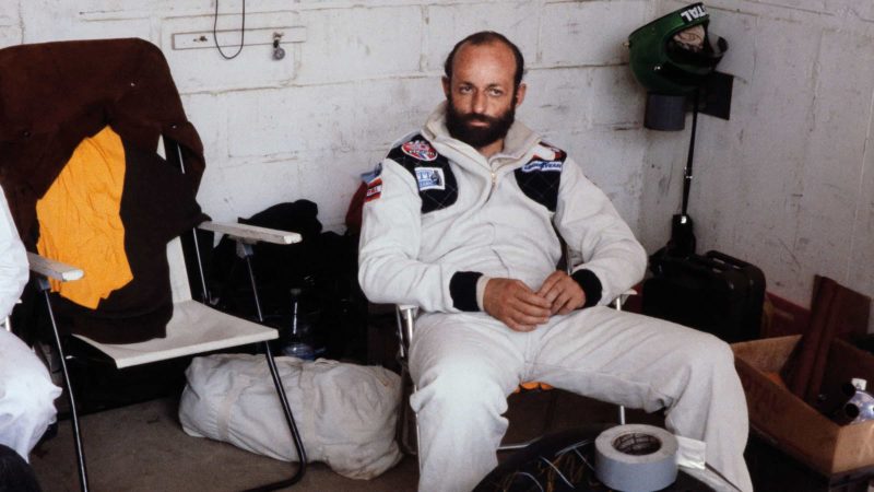 Henri Pescarolo sitting in the garage