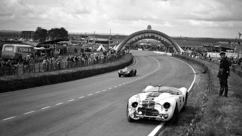 Jaguar C-type passes the crashed Cunningham C-2R