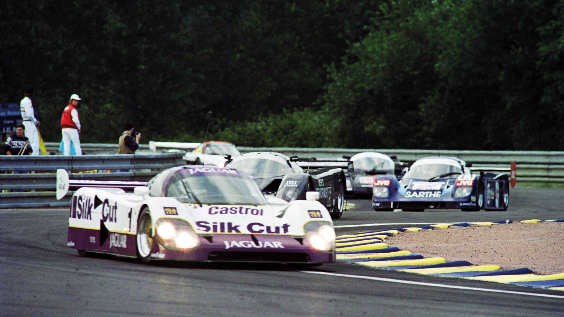 Jaguar leads the group down the Mulsanne chicanes