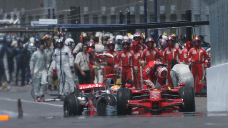 Kimi Raikkonen climbs out of his Ferrari after being hit by McLaren of Lewis Hamilton at the 2008 Canadian Grand Prix