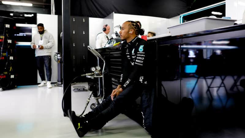 Lewis Hamilton sitting in Mercedes garage at 2023 Australian Grand Prix