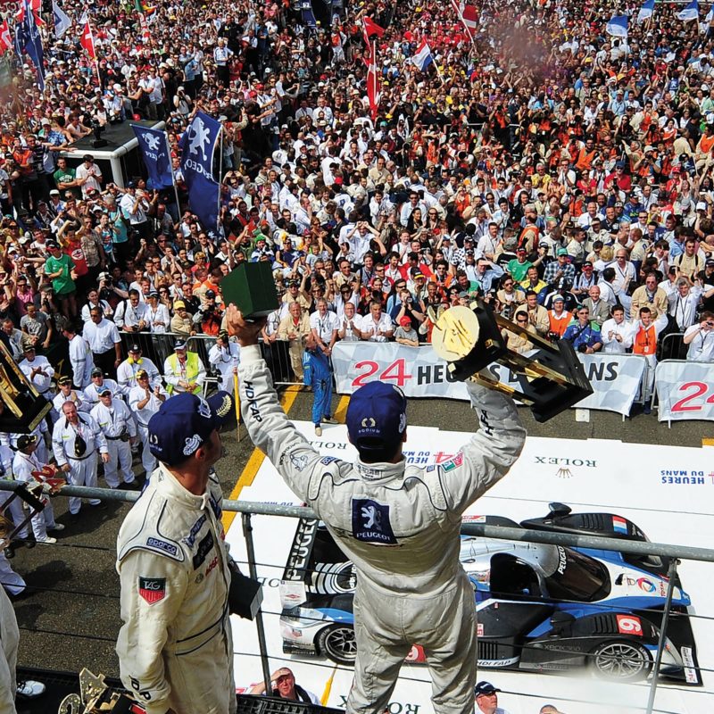 Marc Gené and David Brabham on the podium