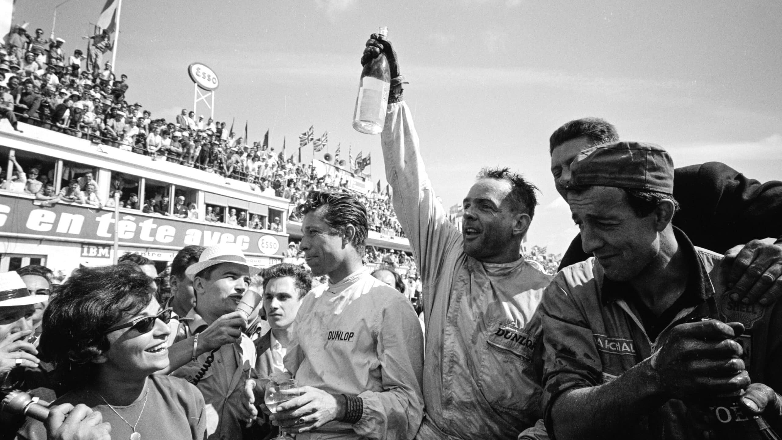 Olivier Gendebien celebrates with Phil Hill