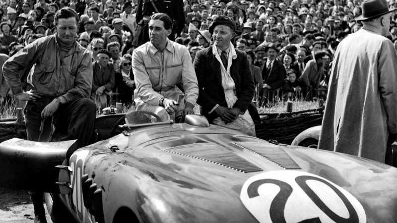 Peters,-Walker-and-Whitehead-seated-on-their-Jaguar-XK120C-in-1951