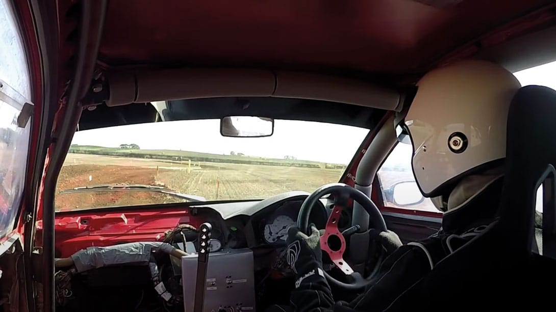 Rally driver shot from inside car