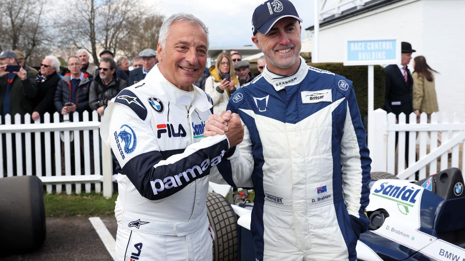 Riccardo Patrese and David pose for cameras